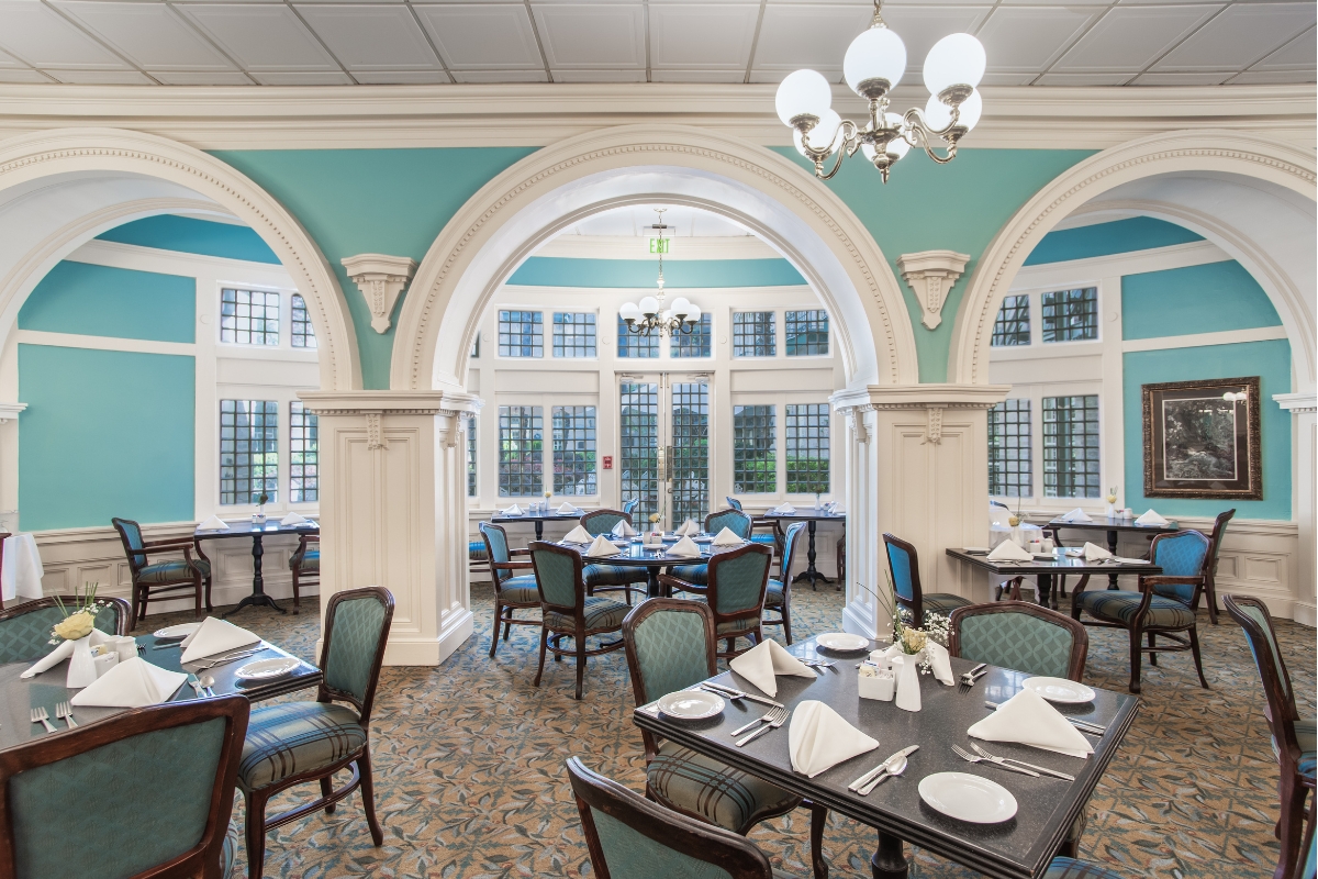 a room with tables and chairs