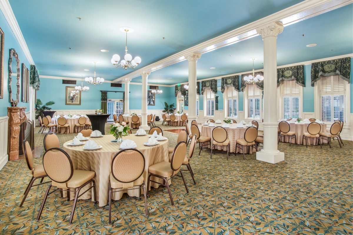 a room with tables and chairs