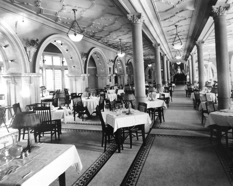 a restaurant with tables and chairs