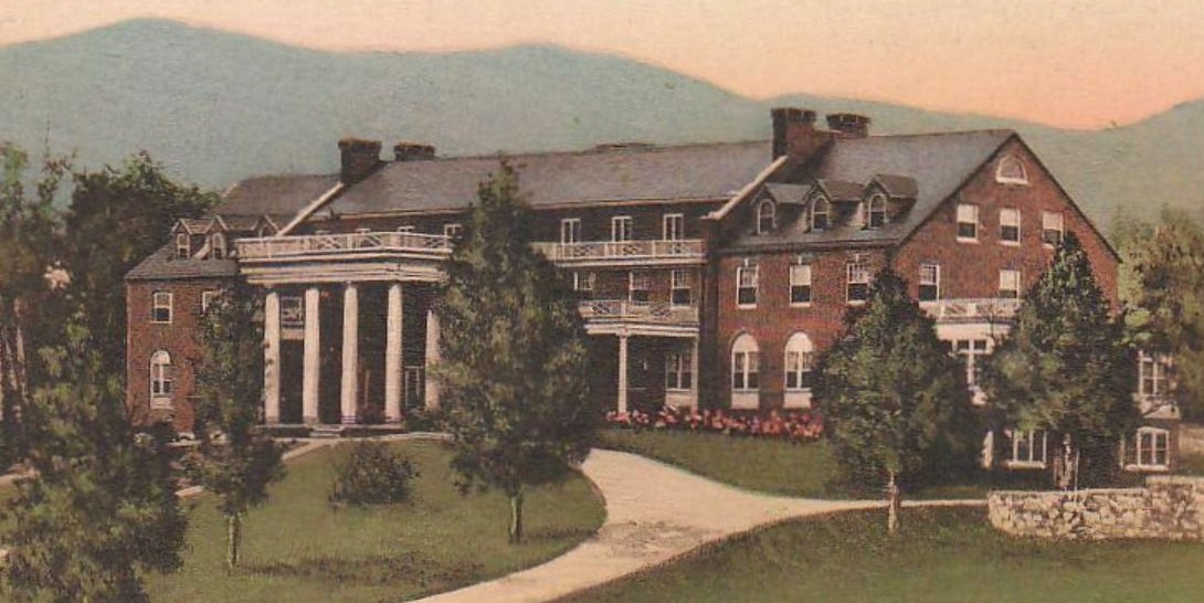 a large brick building with columns