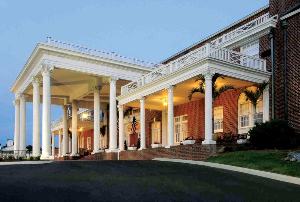 a large brick building with columns