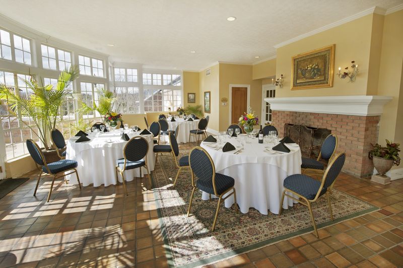 a room with tables and chairs