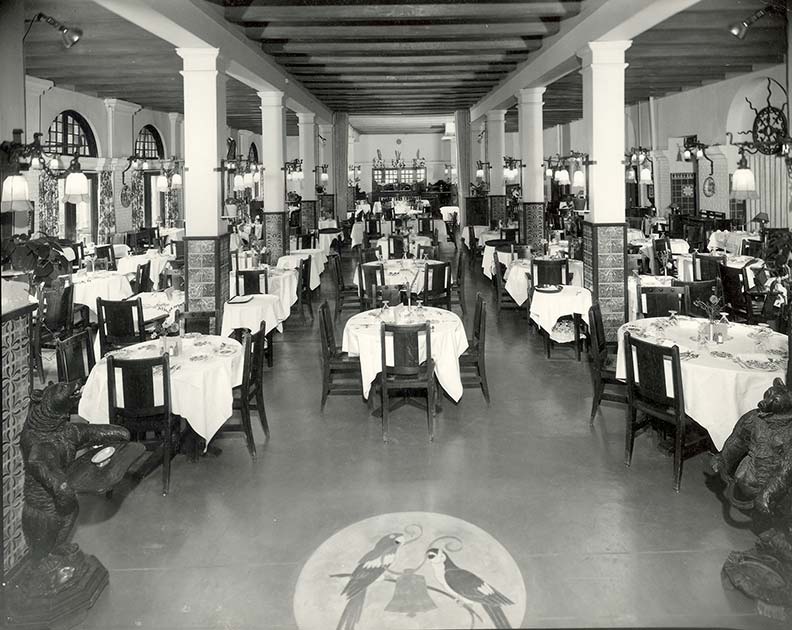 a restaurant with tables and chairs