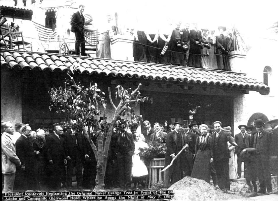 a group of people standing outside a building