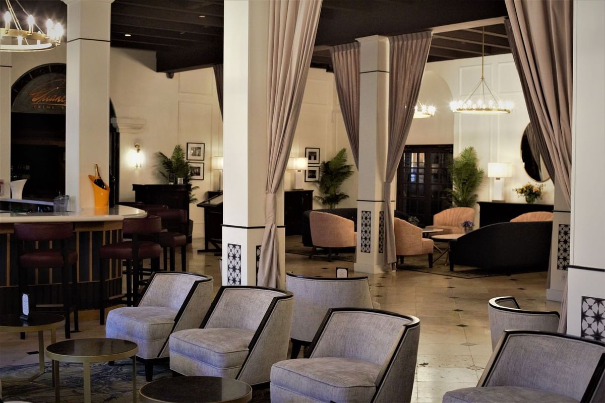 a room with chairs and tables