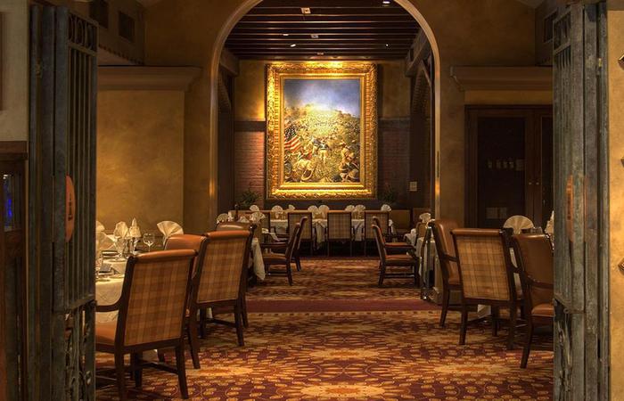 a room with tables and chairs