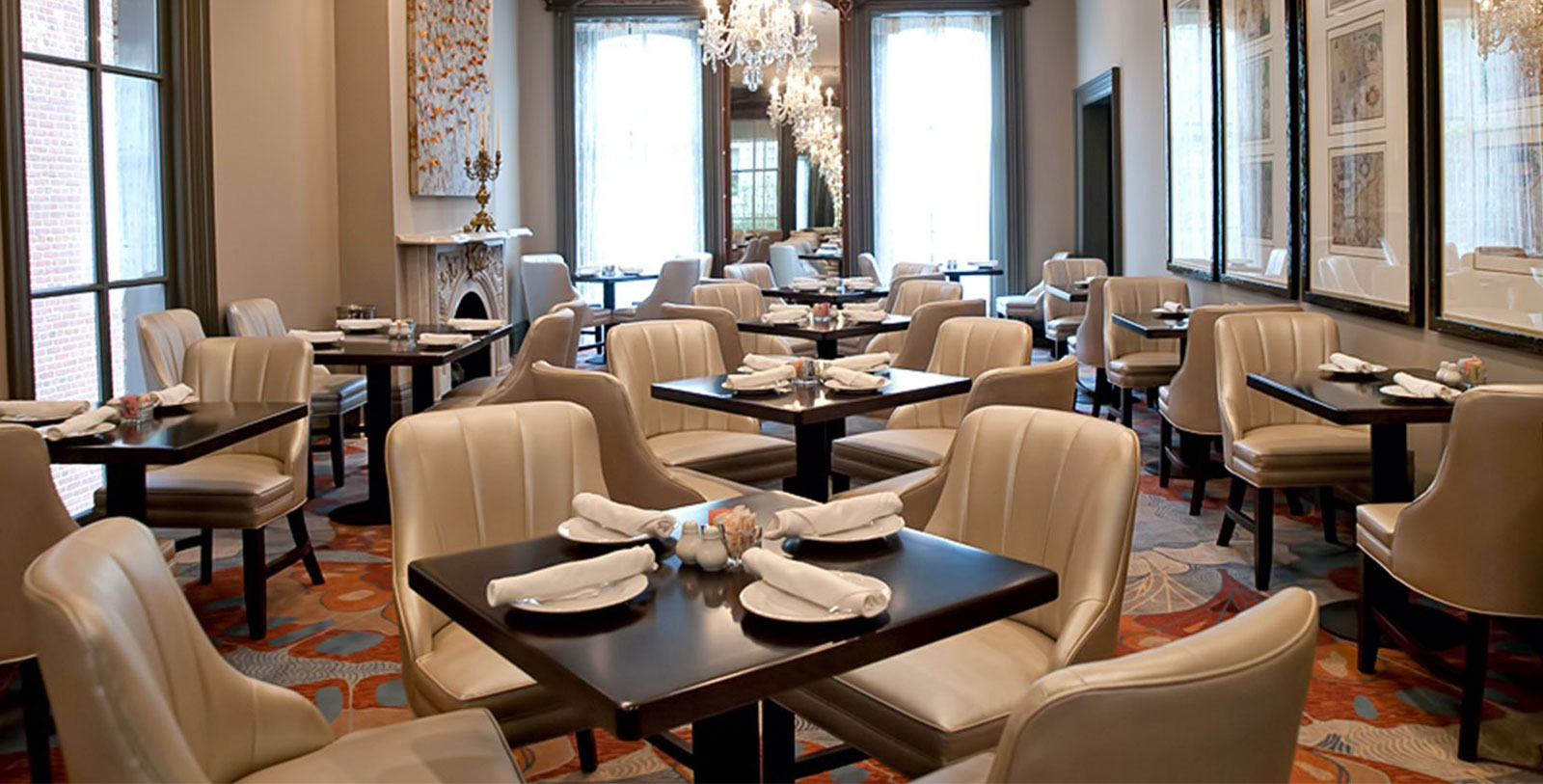 a restaurant with tables and chairs