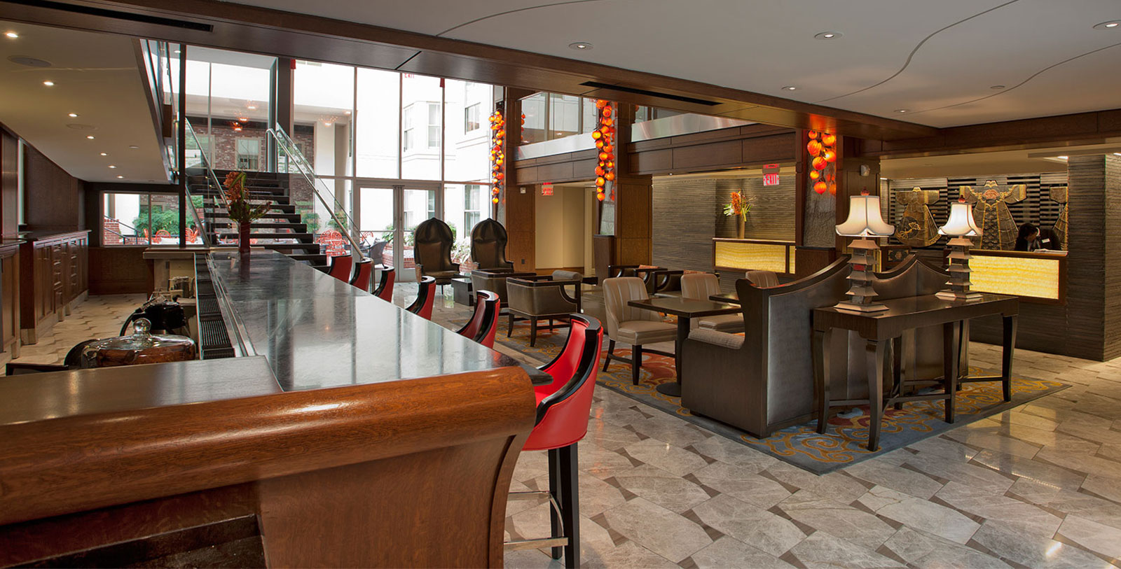 a room with a large table and chairs
