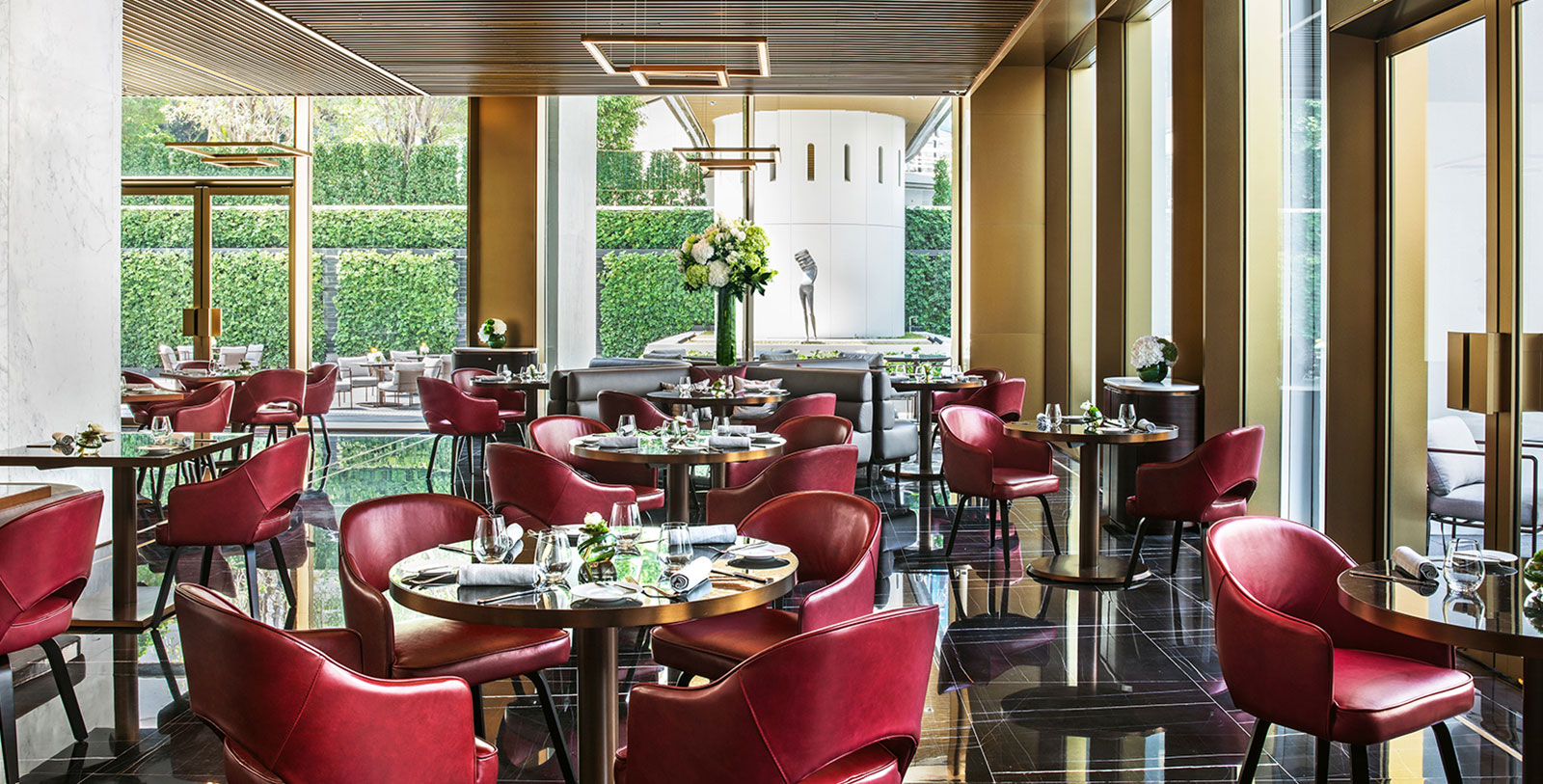 a restaurant with tables and chairs