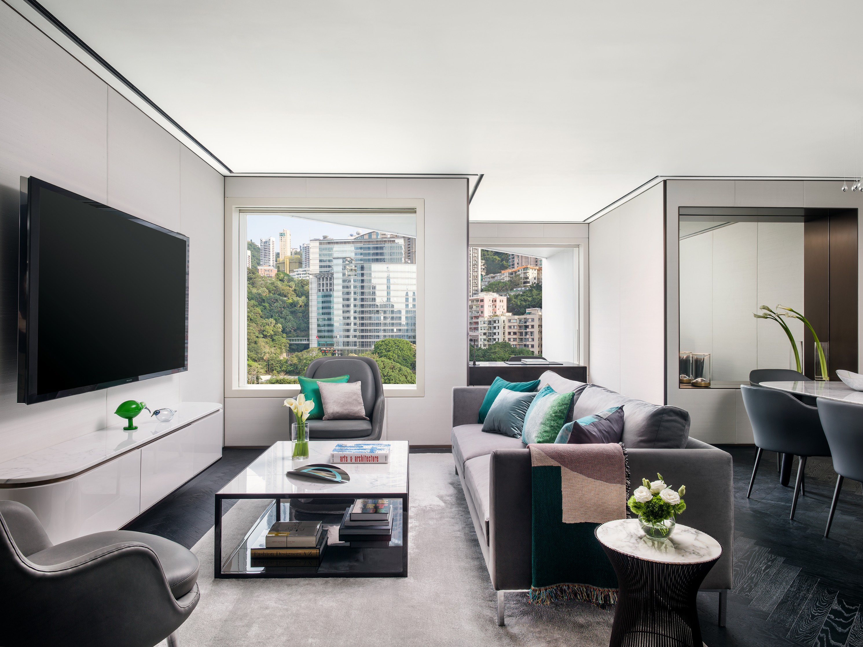a living room with a television and a couch
