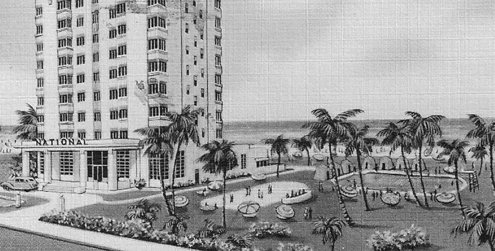 a building with palm trees and a pool