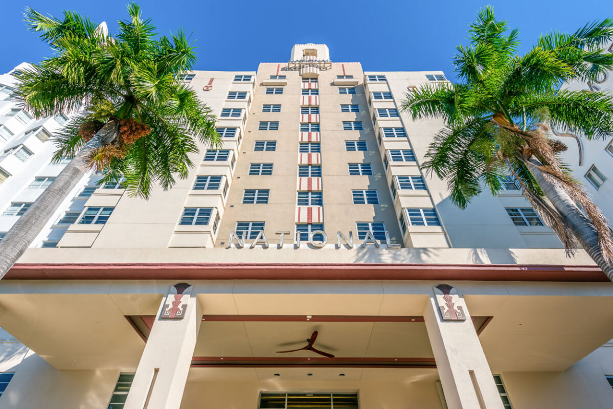 a building with palm trees