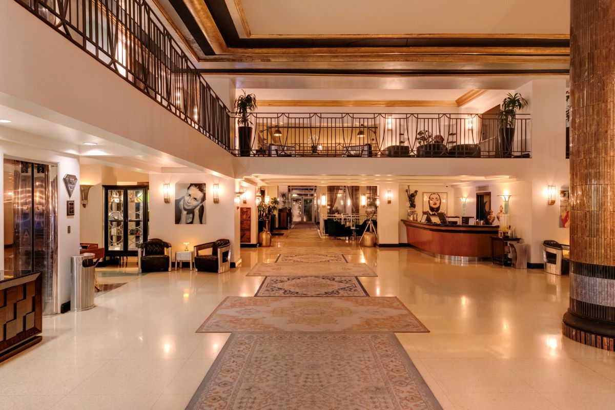 a large hall with a large staircase and a large counter