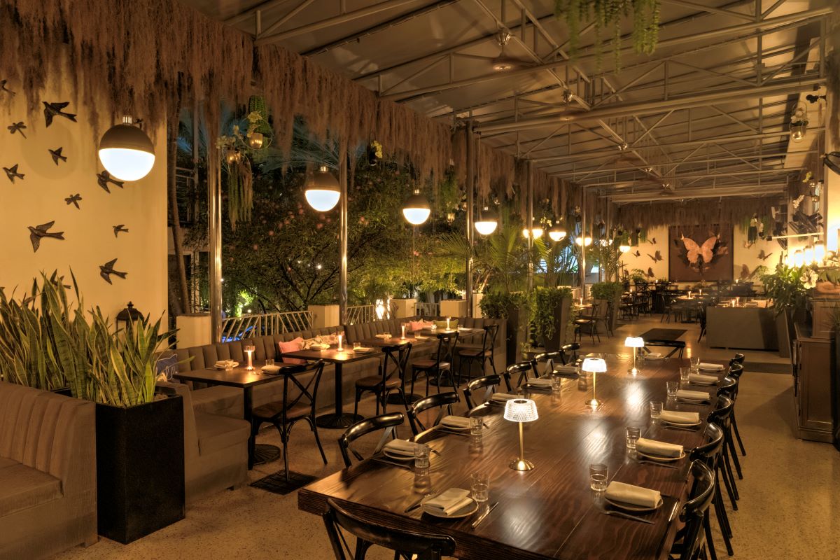 a restaurant with tables and chairs