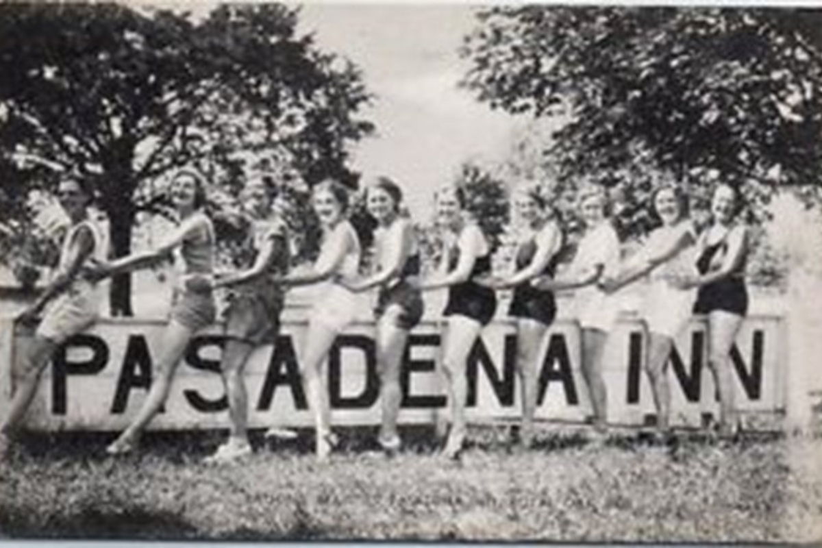 a group of women posing for a photo