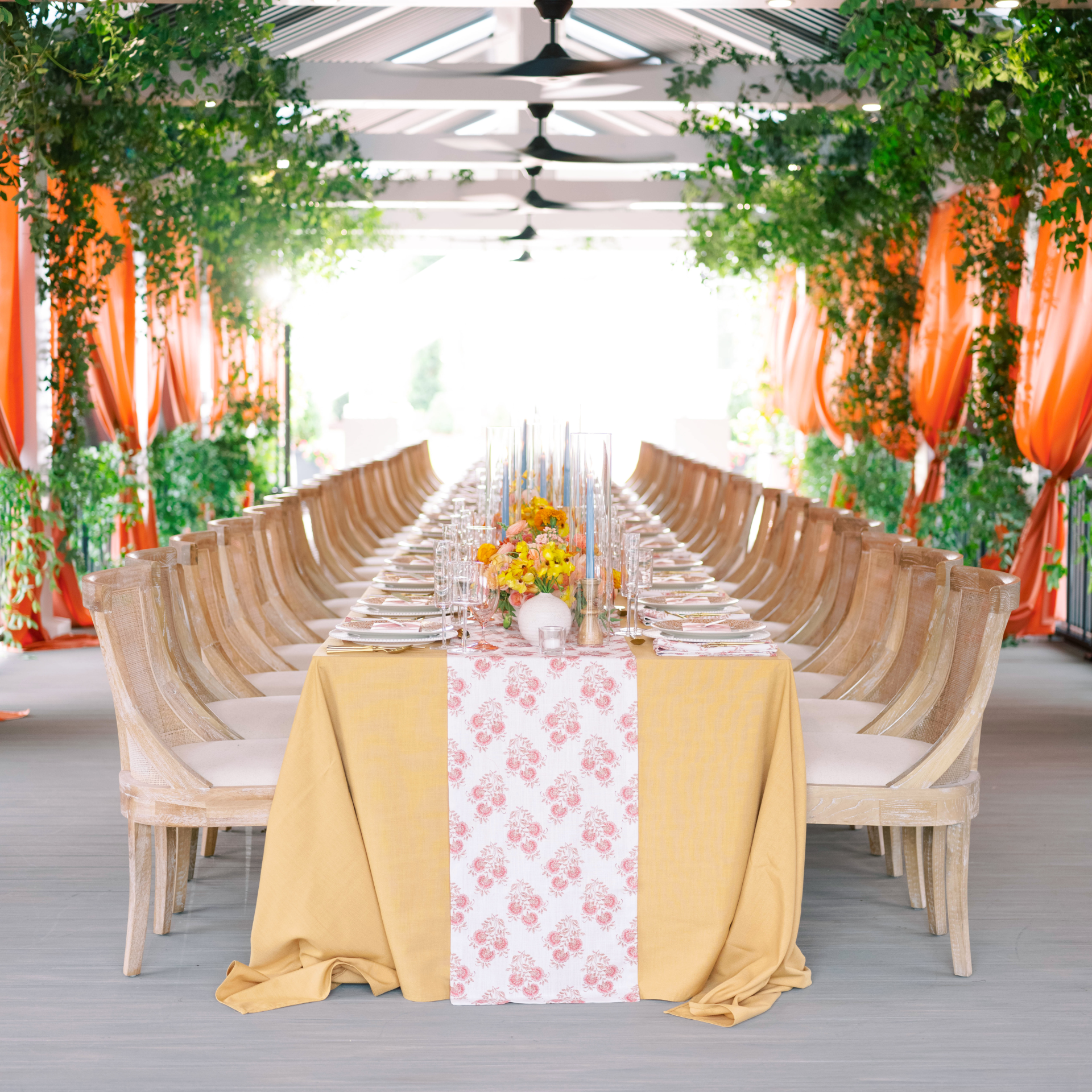 a long table set for a dinner party