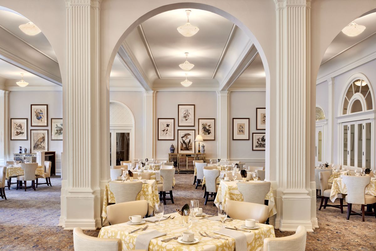 a room with tables and chairs