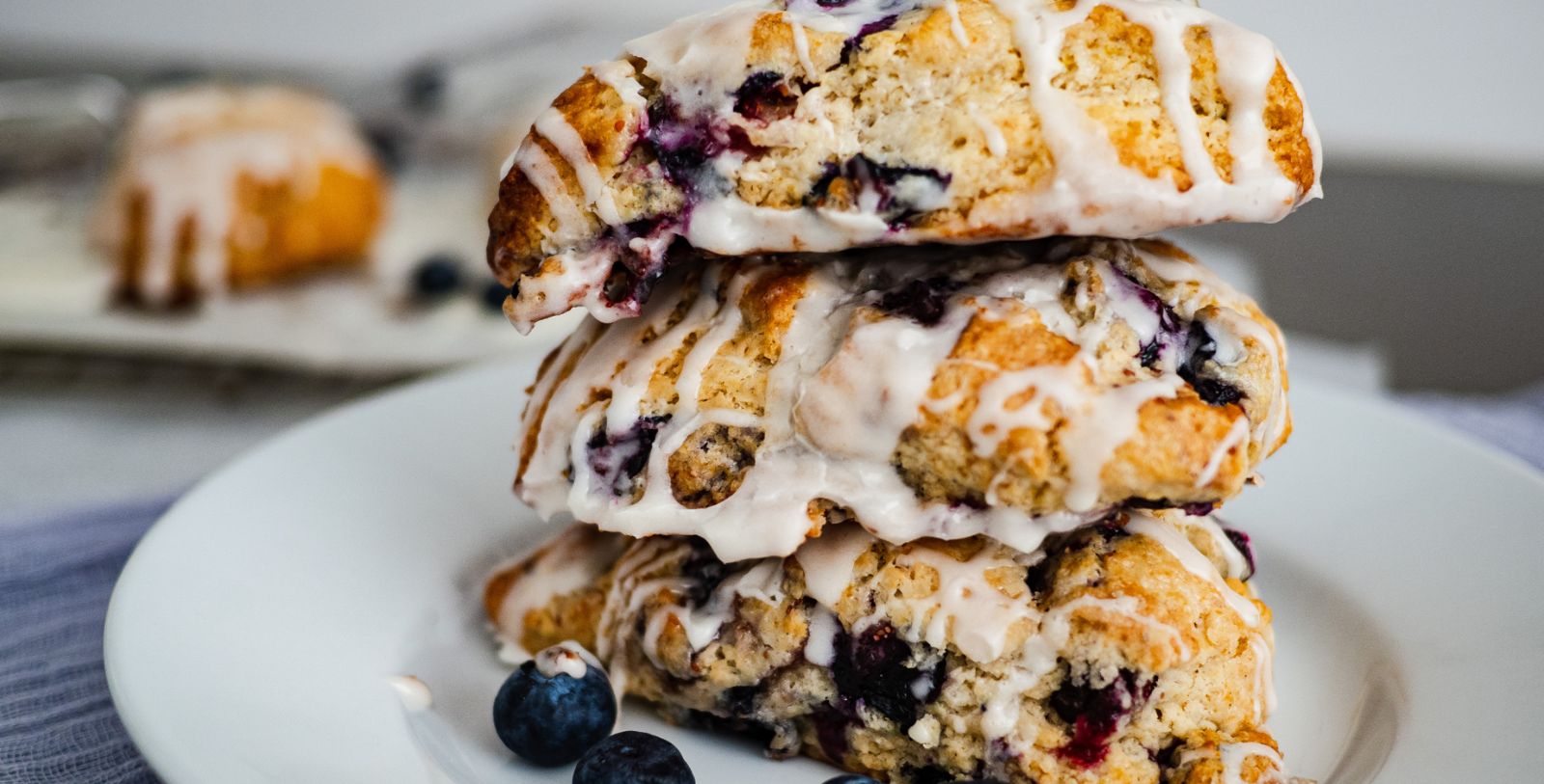 a stack of blueberry scones