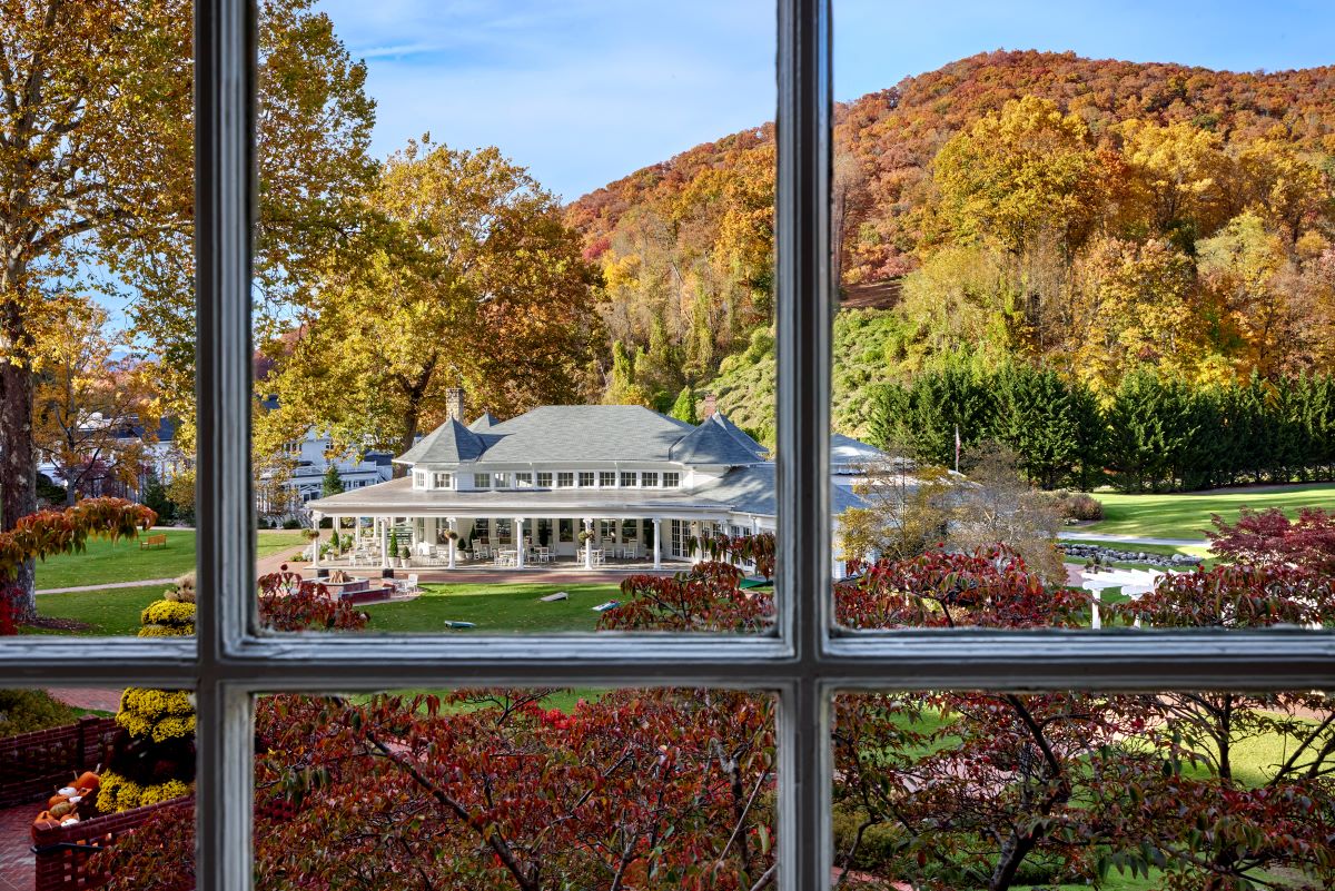 a view of a large house through a window