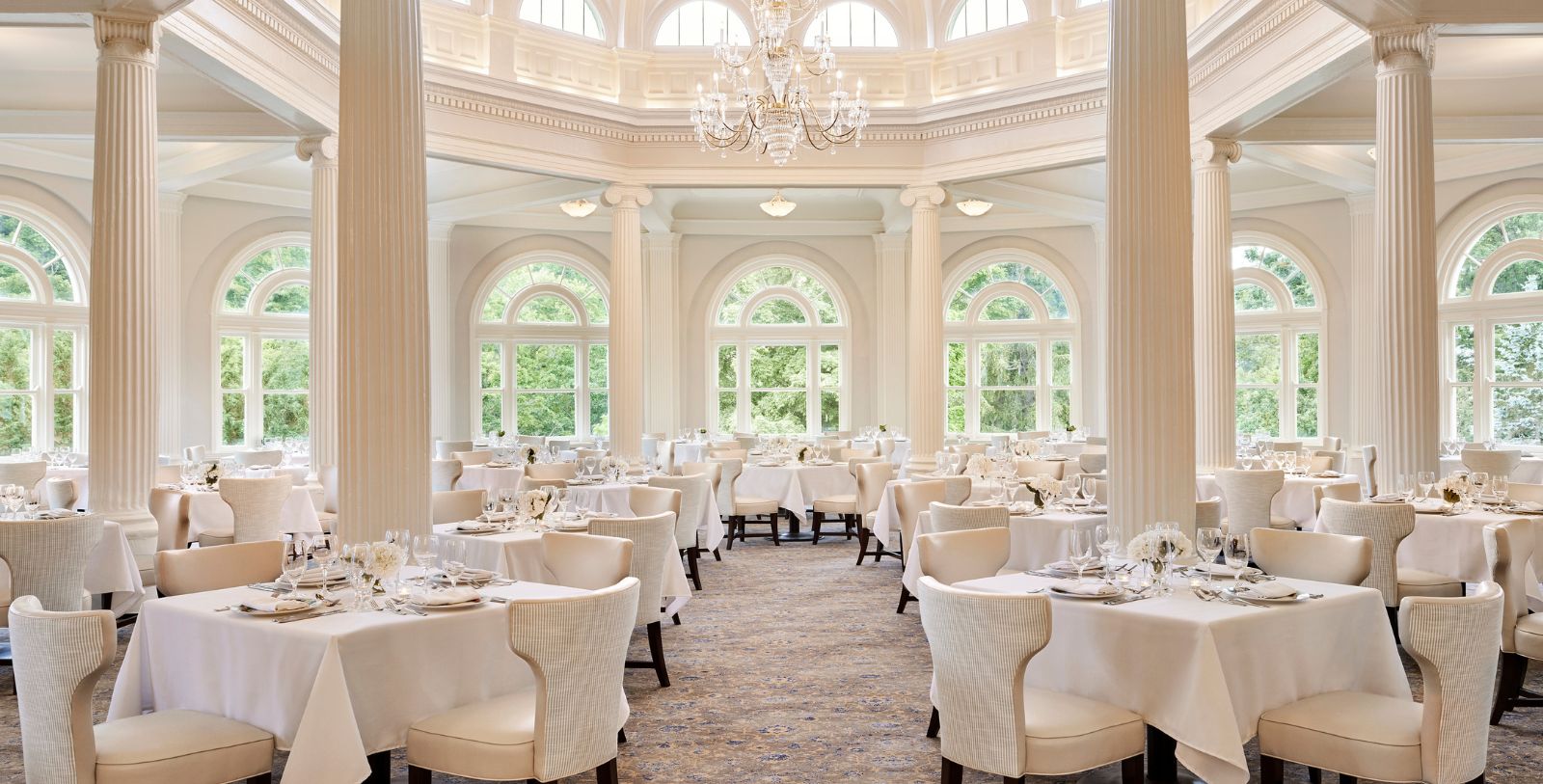a room with tables and chairs