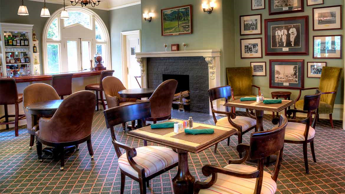 a restaurant with tables and chairs