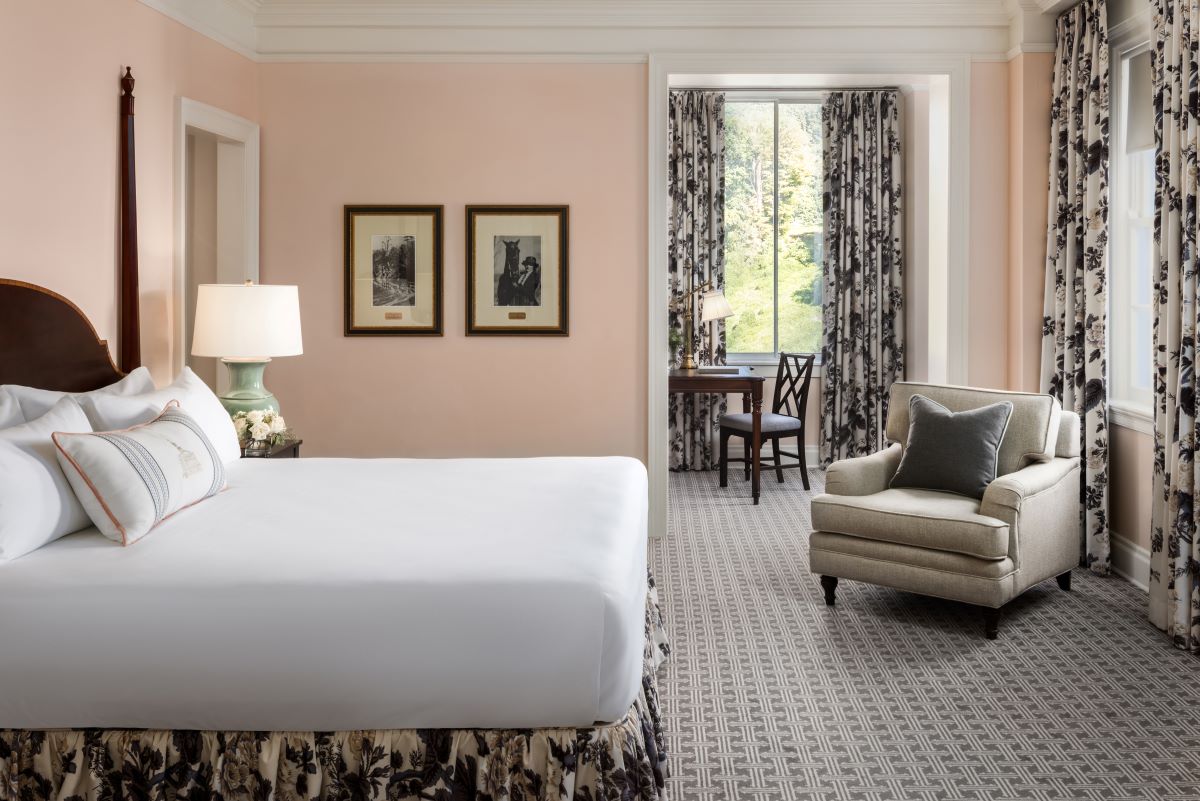 a room with a bed and a chair