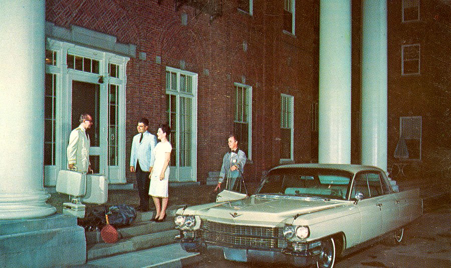 a group of people standing outside a building