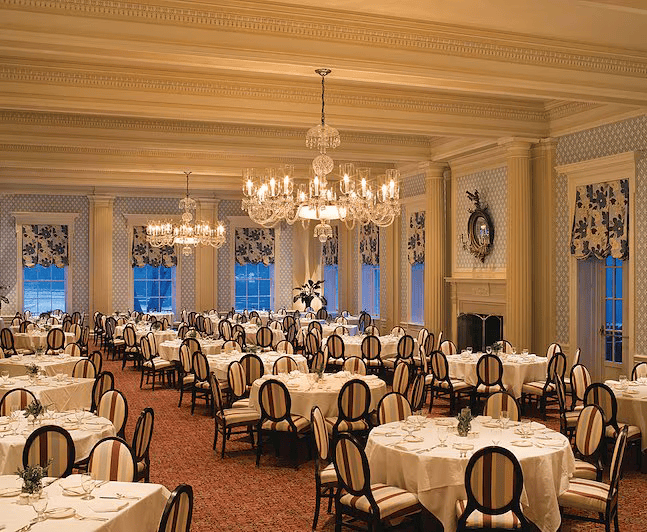 a large room with tables and chairs