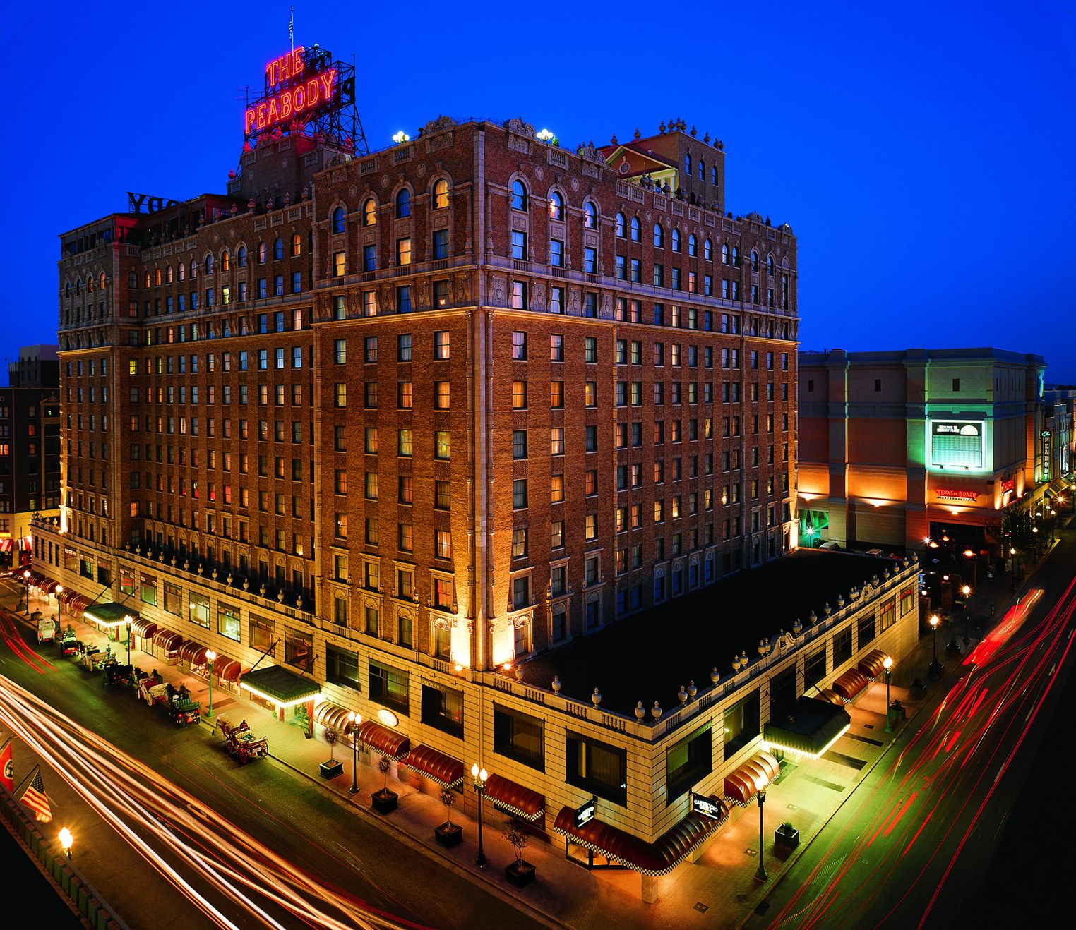 Peabody Hotel with lights on the side