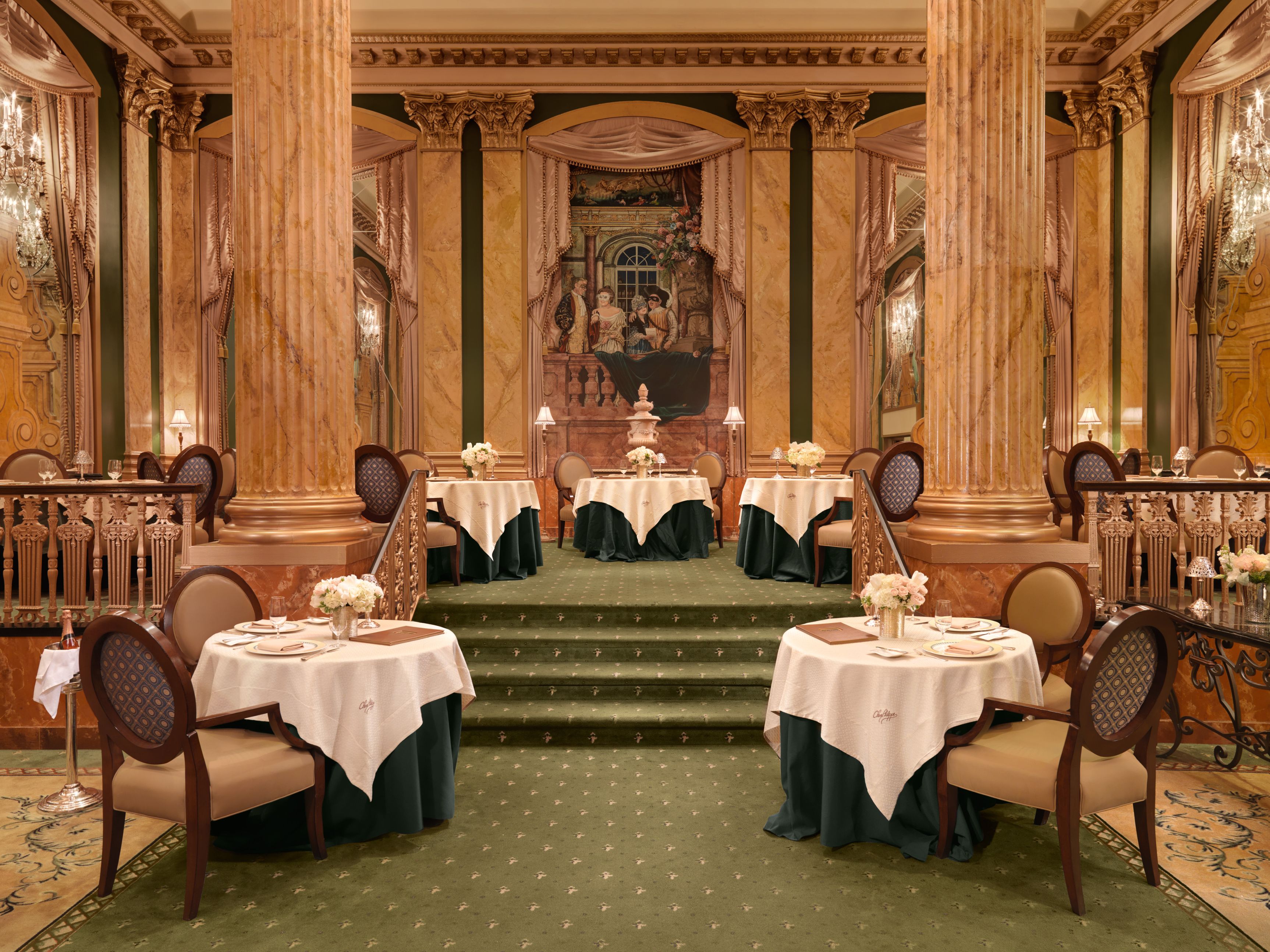 a room with tables and chairs