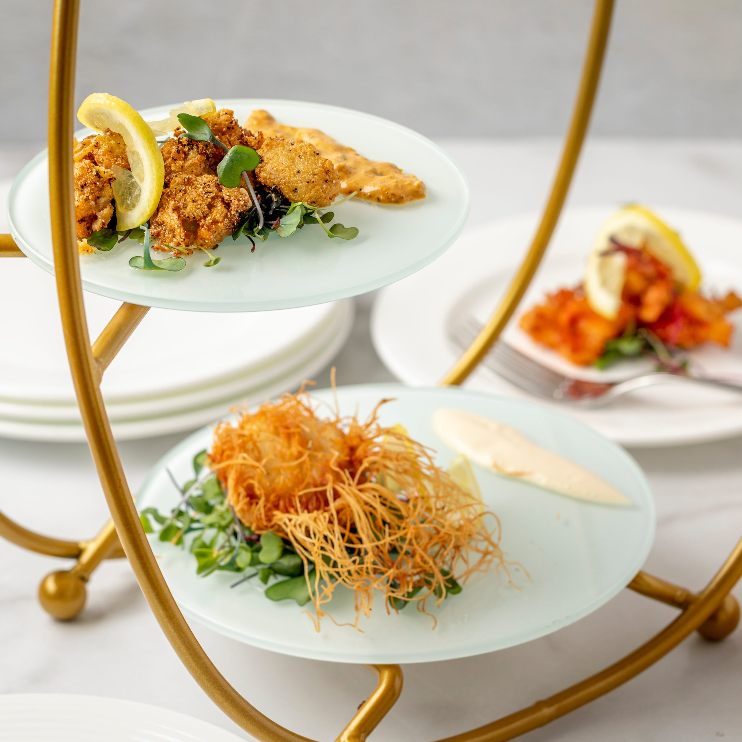 a plate of food on a stand