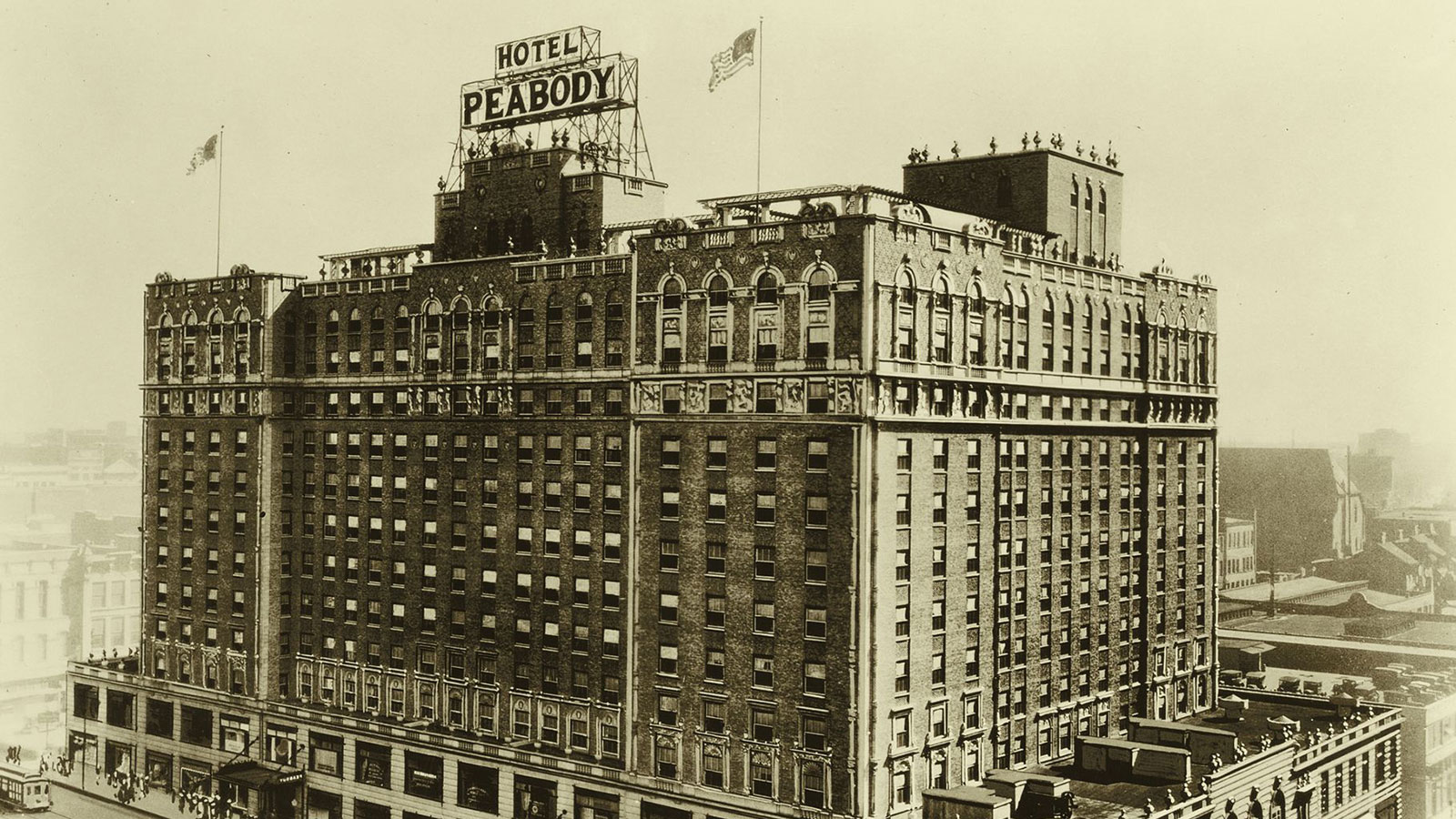 a large building with a flag on top