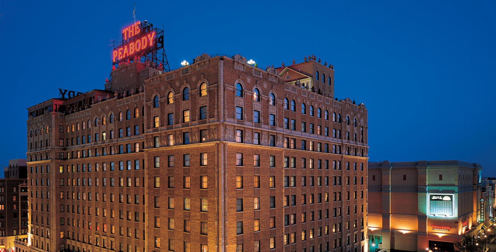 Peabody Hotel with a sign on top