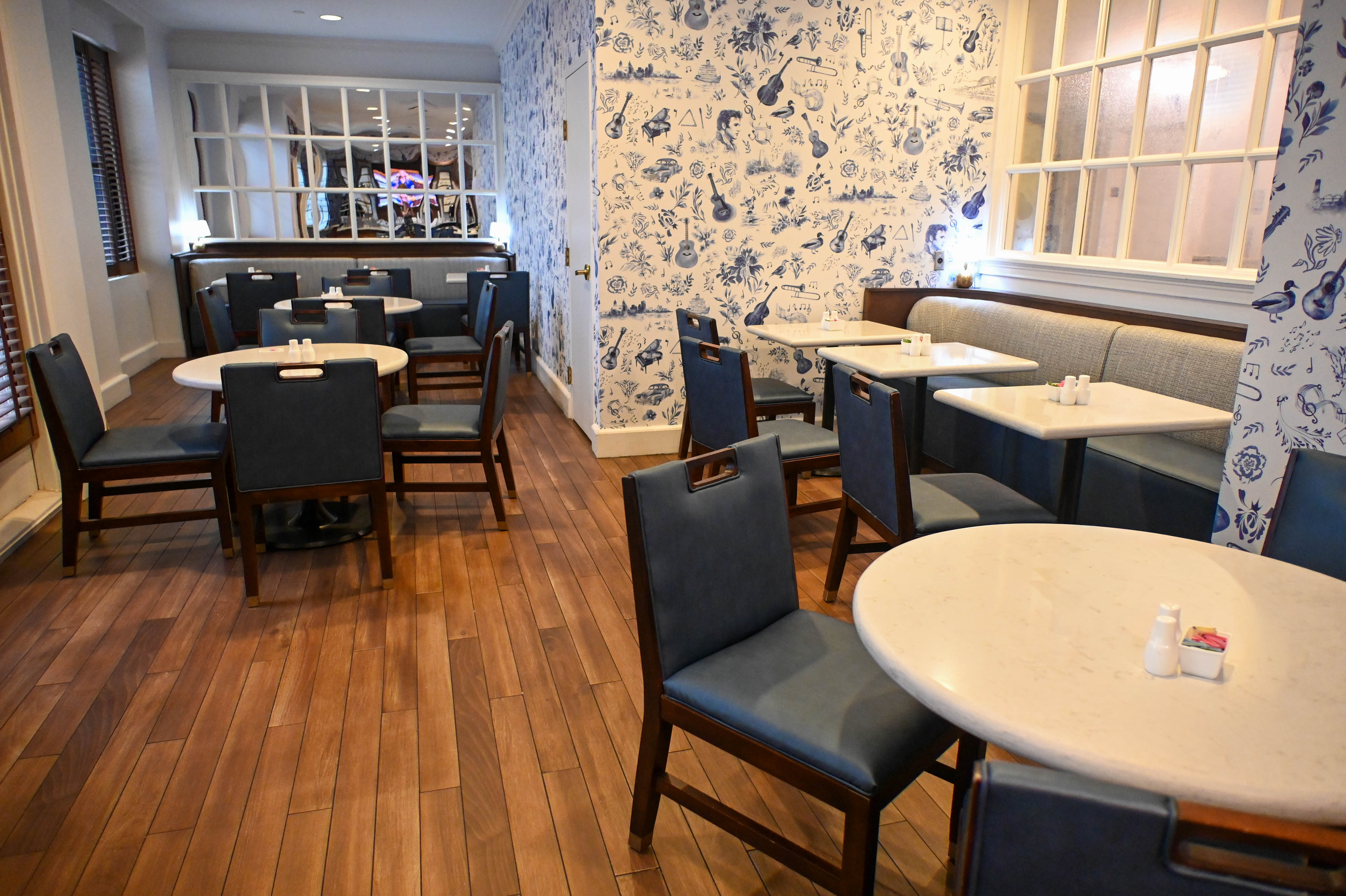 a room with tables and chairs