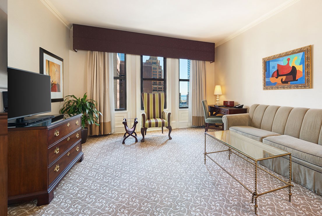 a room with a couch and a chair