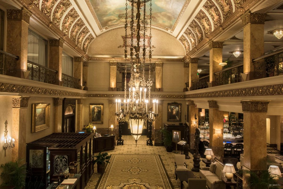 a large ornate building with chandeliers