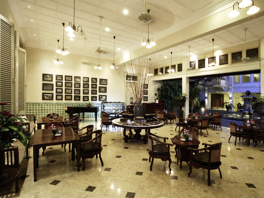 a room with tables and chairs
