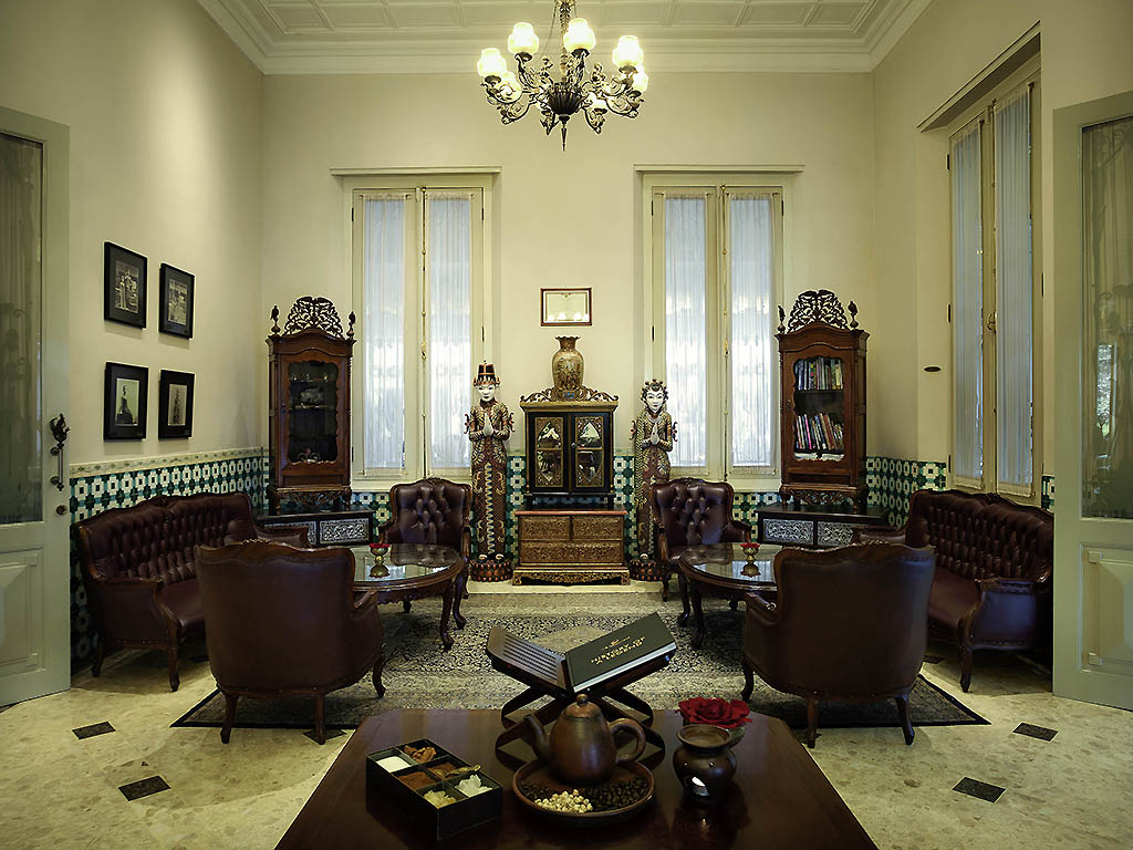 a room with furniture and a chandelier