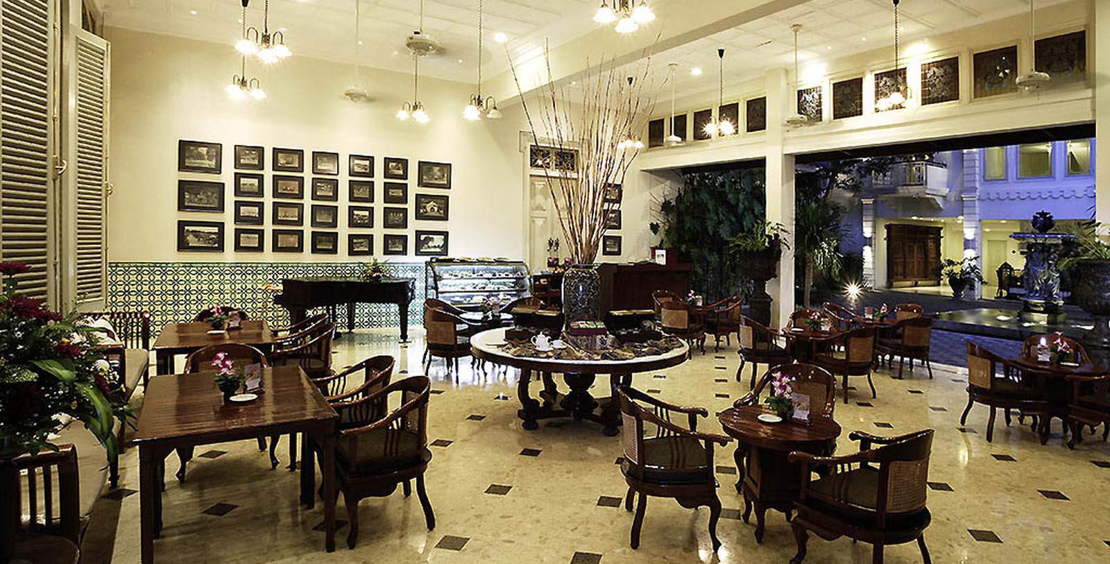 a room with a large table and chairs