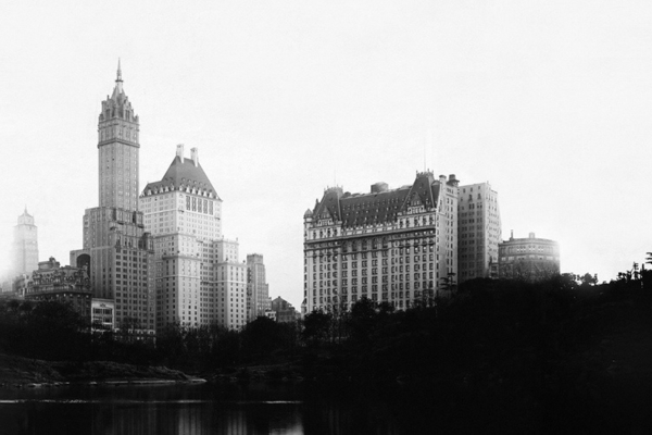 a group of buildings next to a body of water