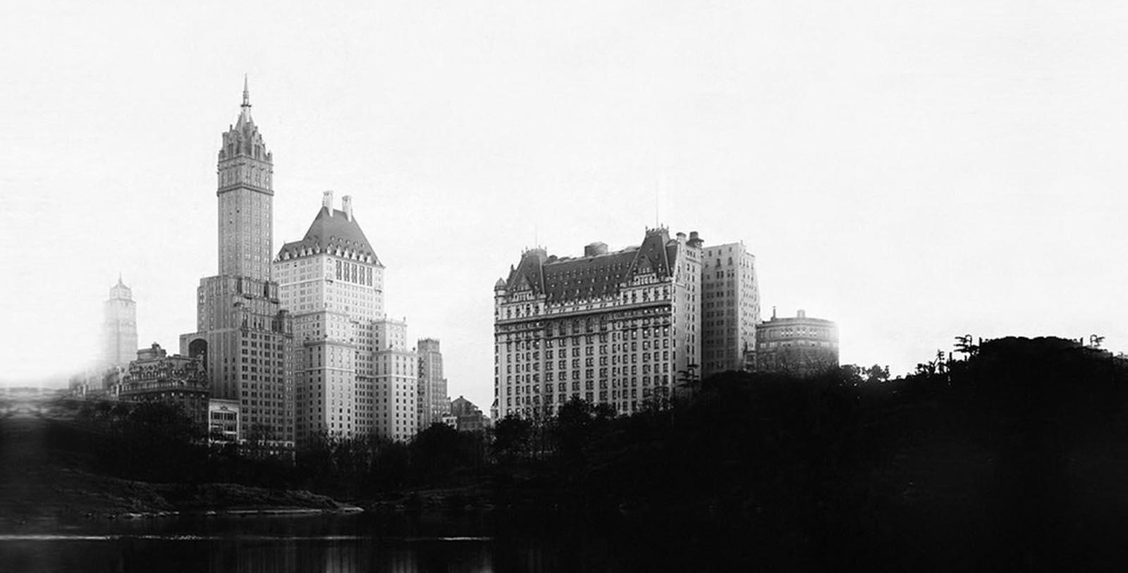 a group of buildings next to a body of water