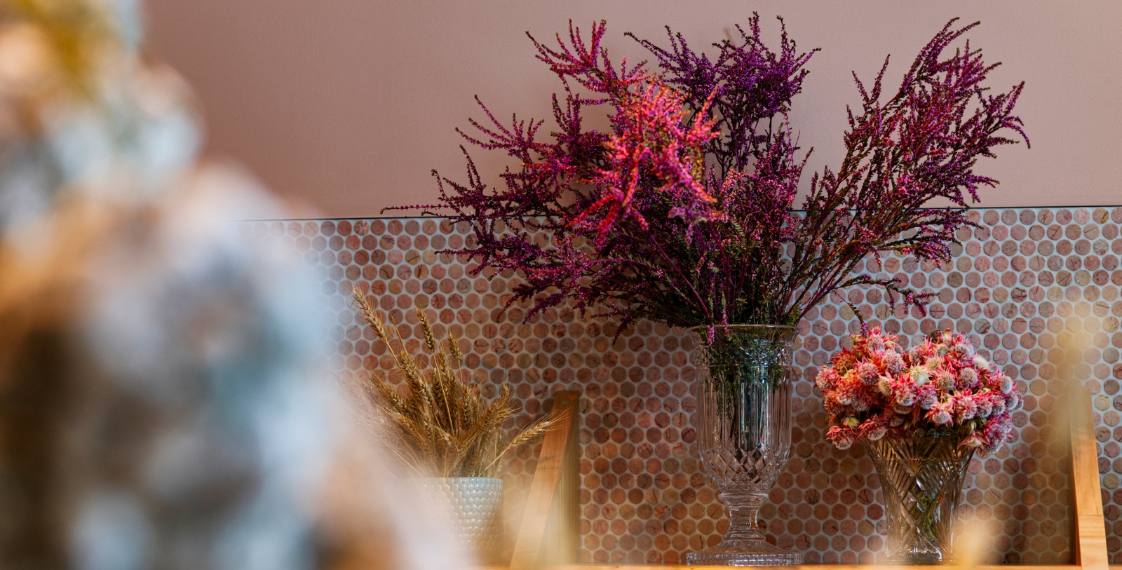 a vase with purple flowers