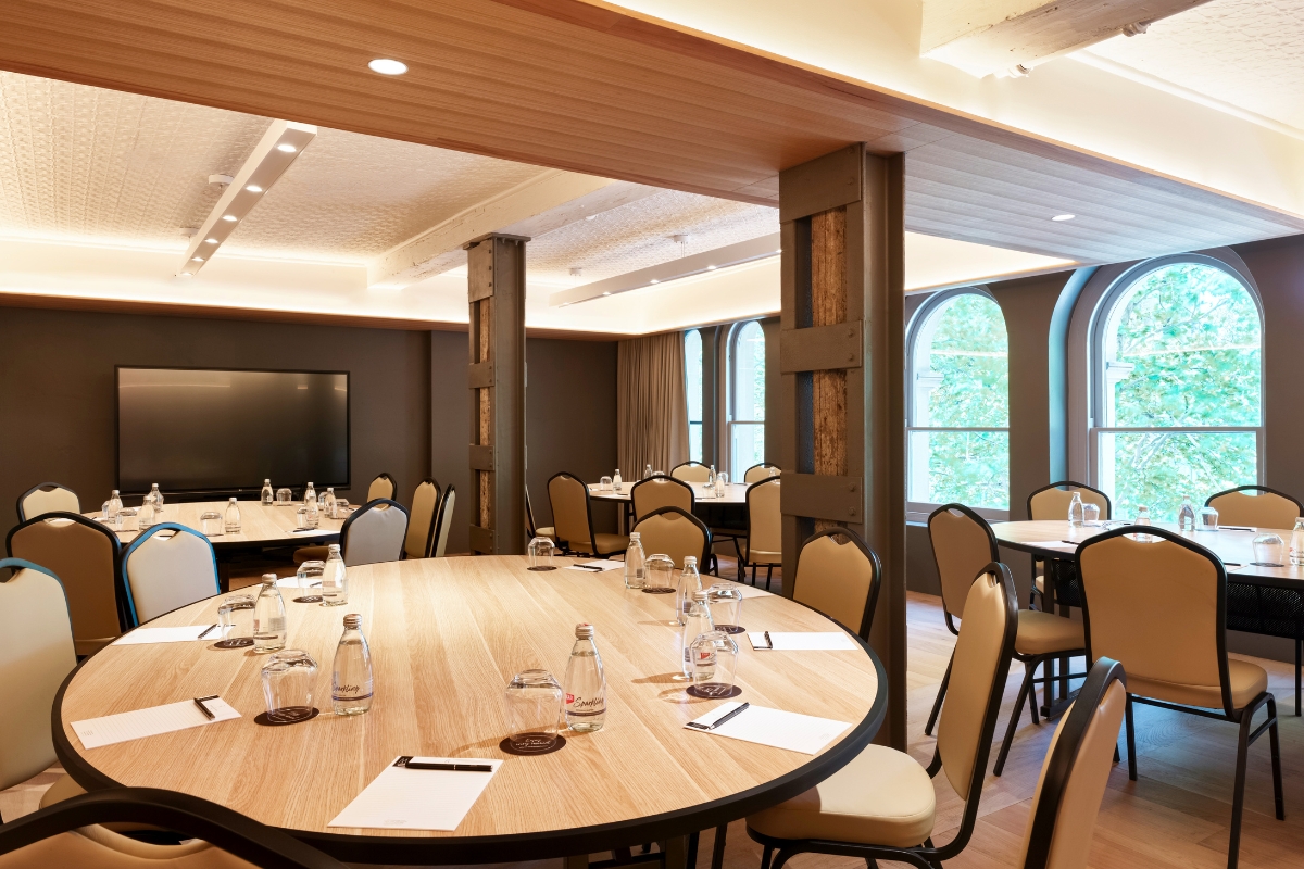 a room with tables and chairs