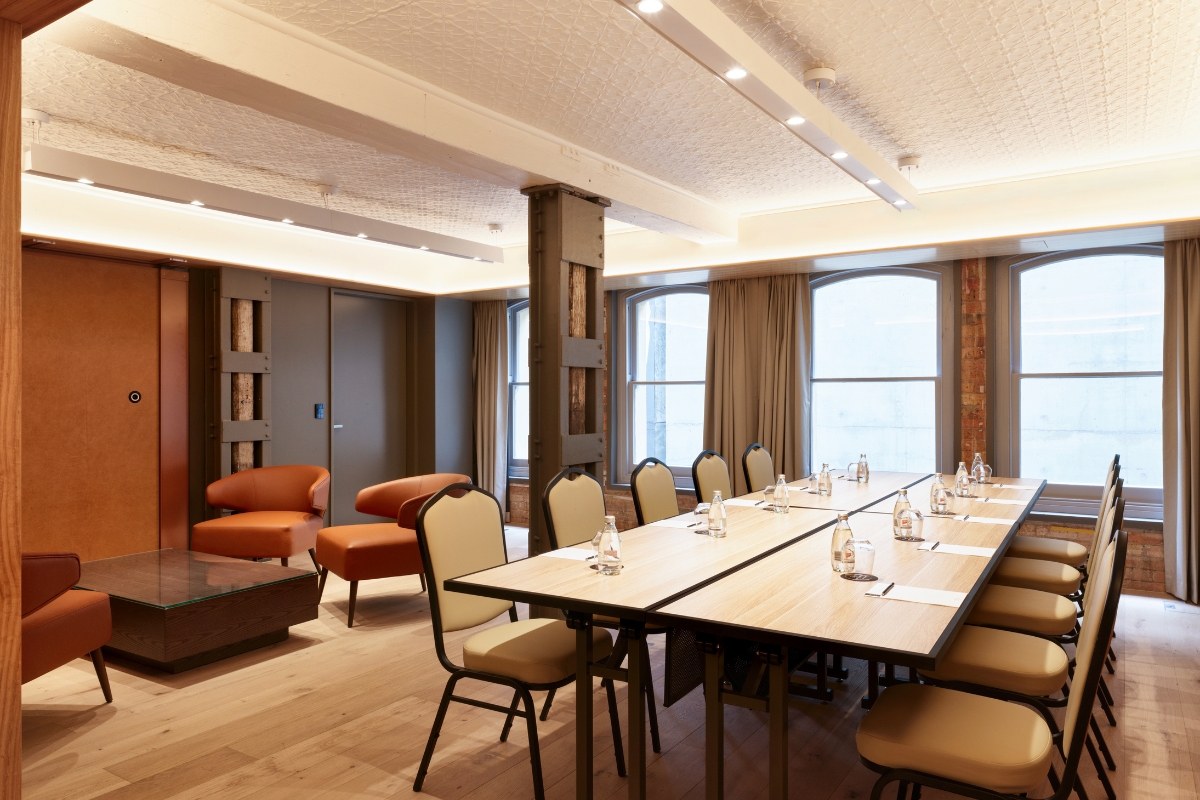 a room with a table and chairs