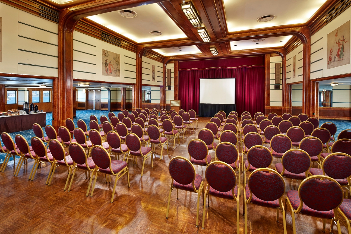 a room with rows of chairs