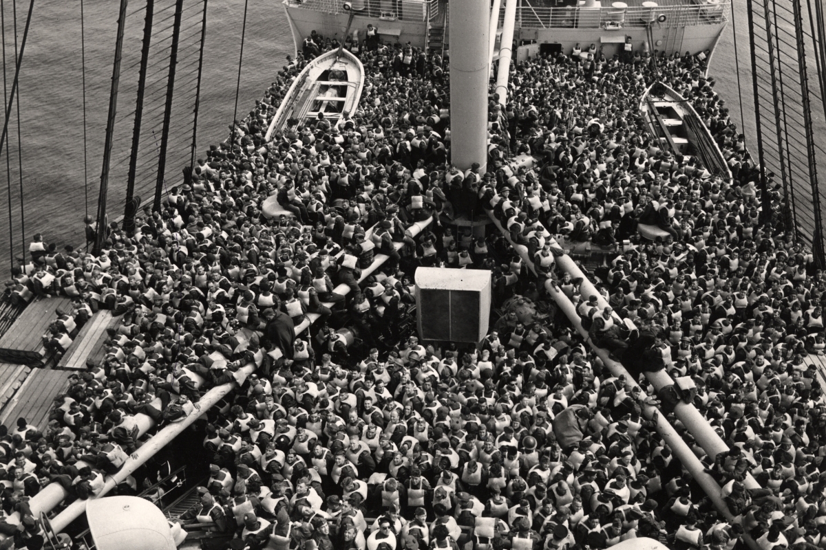 a large group of people on a boat