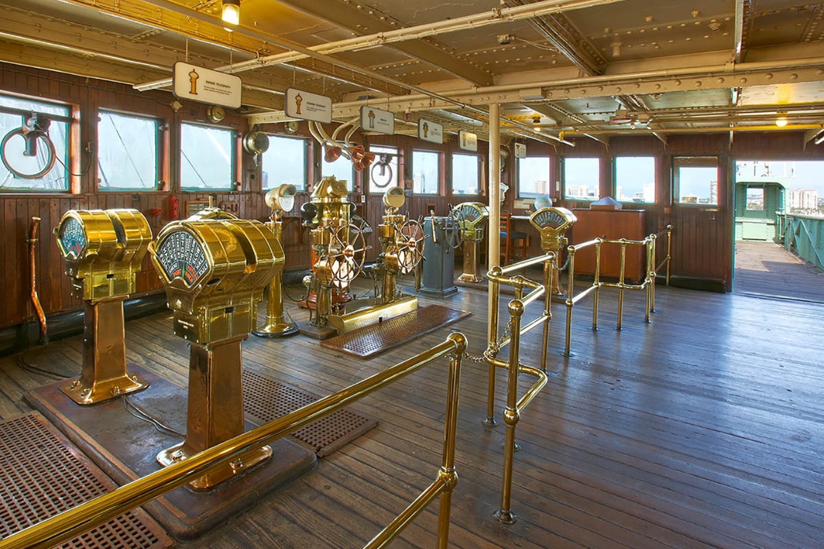 a room with a bridge and a few machines