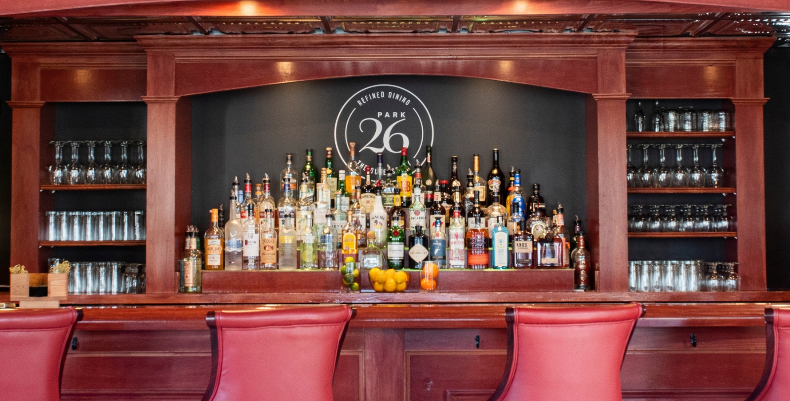 a bar with bottles of alcohol