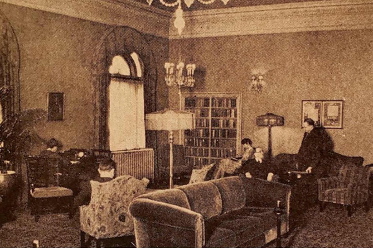 a group of people sitting in a living room