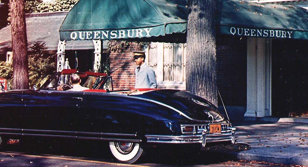 a man standing in a car